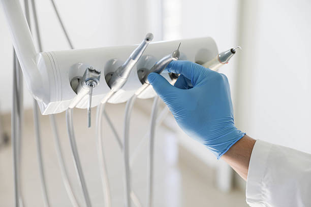 Professional Tooth Extraction technician working in Cherry Hill Mall, NJ